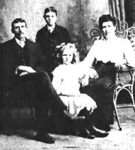 Arthur Bryan as and adult with his family